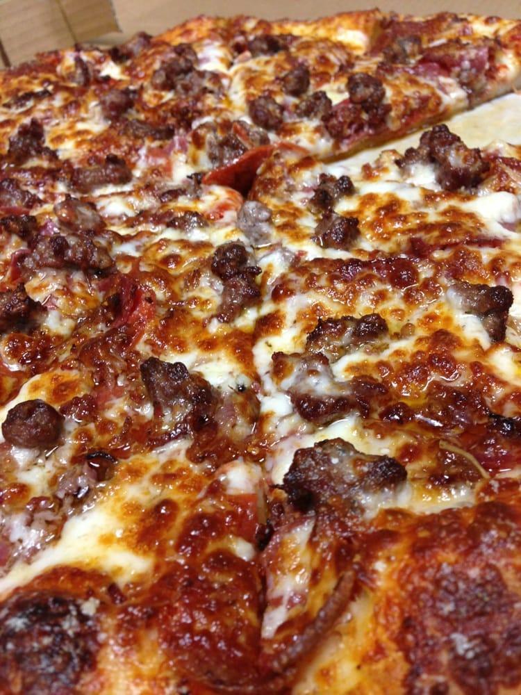 Meat Lover Pizza · Red sauce, mozzarella cheese, pepperoni, ham-Canadian bacon, Italian sausage, salami and linguica.