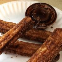 Churros · Fried-dough pastry with cinnamon and sugar.