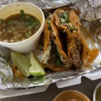 Tacos Tapatios · 2 Authentic Mexican Birria Tacos, Jalisco-Style, made with braised beef roast slow cooked. S...