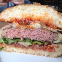 Nostalgia Burger · Butter lettuce, tomato, caramelized onion, American cheese, ACME bun.