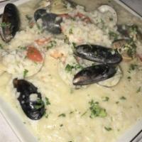 Fettucine Alla Pescatora · Homemade pasta with mussels, clams, calamari and shrimp