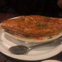 Chicken Pot Pie · Chunks of all white meat chicken and garden vegetables with natural gravy, topped with a fla...