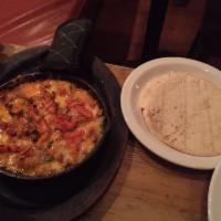 Queso Fundido · Blend of Mexican cheeses.