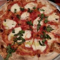 Margherita Pizza · Tomato sauce, Buffalo mozzarella, fresh basil.