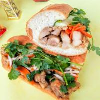 Grilled Chicken Sandwich · Foot long sandwich cut in half served with pickled carrot, daikon, radish, cucumber, cilantr...