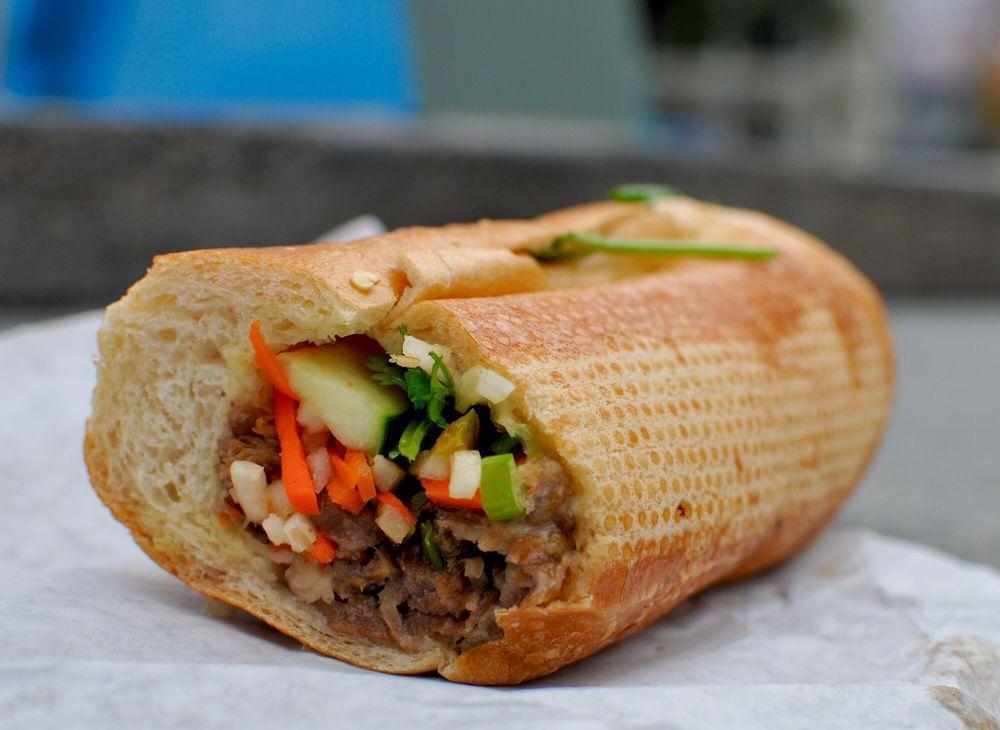 Grilled Beef Sandwich · Foot long sandwich cut in half served with pickled carrot, daikon, radish, cucumber, cilantro, and jalapeno unless requested otherwise.