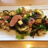 Warm Brussels Sprouts Salad · Brussels, Cauliflower, seasonal fruit, house tofu croutons and Thai vinaigrette. Contains fi...