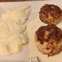 Broiled Crab Cakes · Complimented with a champagne cream sauce complete with chef's vegetables and mashed potatoes.