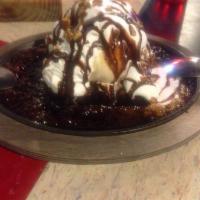 Willie Wonka · Triple chocolate brownie, topped with ice cream, whipped cream, chocolate sauce, and chopped...