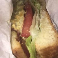 California Chicken Sandwich · Charbroiled chicken breast, guacamole, bacon, Swiss cheese, mayonnaise, lettuce and tomato o...