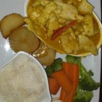 Yellow Curry · Choice of meat simmered with yellow curry in coconut milk with sweet potato and served with ...