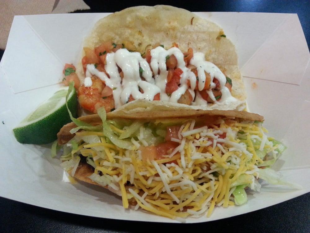 Shredded Beef Taco · Crispy shell. Topped with lettuce, tomatoes, and cheese.