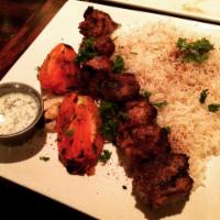 Lamb Tikka Kabob Sandwich · Lamb meat seasoned, marinated and grilled to perfection folded into delicious flatbread. Ser...