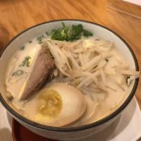 Tonkotsu Ramen · Egg noodle in a rich pork broth with tender braised pork, soft-boiled egg, scallions, and be...