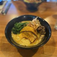 Vegan Coconut Squash Ramen · butternut squash with coconut milk broth, market fresh vegetables and crispy onions.