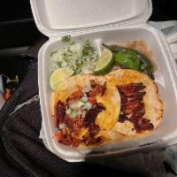 Tacos · Scrambled eggs with cheese and choice of chorizo, bacon, beans, ham, potato, or sausage.