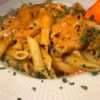 Penne Alla Vodka Dinner · Made in a pink vodka sauce of cream, Parmesan cheese, a touch of tomato and fresh basil.