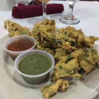 Spinach Pakora · Fried spinach fritters.