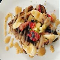 French Toast · Classic French toast loaded with fruit and glazed with our house made apple sauce and served...