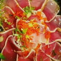 Tuna Tataki · Seared and sliced with fish eggs, scallions and ponzu sauce.