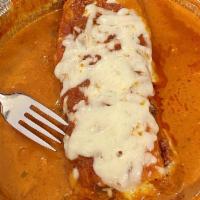 Lasagna · Layered pasta with robust meat sauce and flavorful ricotta cheese, topped with mozzarella ch...
