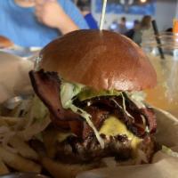 Backyard Burger · Sirloin/Brisket beef patty, tomato, grilled red onion, smoked bacon, sharp cheddar, lettuce,...