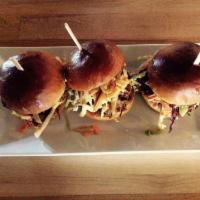 BBQ Pork Sliders · (3) shoyu-pineapple smoked pulled pork sliders, with house-made BBQ sauce and spicy coleslaw.