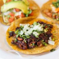 Tacos · Served with cilantro and onion Includes one 1 oz. salsa per Taco. For extra salsa go to extr...