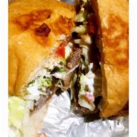 Torta · Includes beans, lettuce, tomatoes, sour cream, and cheese. Two 1 oz. Hot sauces included per...