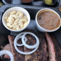 2 Meat Combo Plate · Your choice of two meats, and two sides. Comes with pickles, onions, jalapenos, Texas toast,...