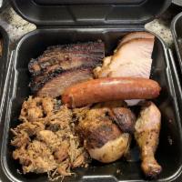 The Family Pack #1 · 1/4 lb. each of brisket, pulled pork, chicken, turkey, and sausage. 6 oz sides included: bak...