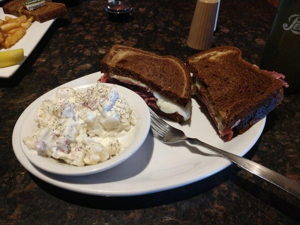 Corned Beef Sandwich · Our homemade corned beef, sliced thick and piled high, then topped with provolone cheese, and served on marble rye.