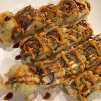 Newberg Roll · White fish, cream cheese, coconut meat, deep fried, topped with sauce, spicy mayo sauce.