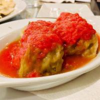 Cabbage Rolls · 2  Beef or Pork Cabbage rolls. Made with cabbage leaves stuffed w/ground meat & rice. Gluten...