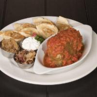 Combo Plate · Pierogi, choice of pork or beef stuffed cabbage roll, covered with signature tomato sauce or...