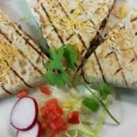 Quesadilla · Melted Jack cheese, pico de gallo, hot sauce, and your choice of meat in a grilled flour tor...