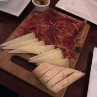 Jamon Iberico · Made of free-range pigs that roam oak forests along the border between Spain and Portugal an...