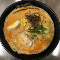 Spicy Miso Ramen · 2 slices of chashu pork, boiled egg, green onion, bean sprouts, and wood ear mushrooms on to...