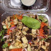 California Chicken Salad · Marinated grilled chicken on a garden salad with avocado, garbanzo beans, red onion, and fet...