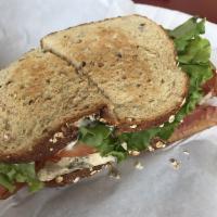 Chicken and Bacon Club Sandwich · Cold sliced roasted chicken breast served on toasted wheat with mayo, lettuce, tomato and ba...