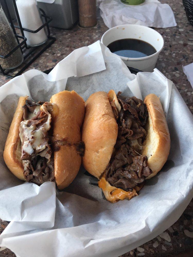 The Big Dipper · 2 x the meat. Tender roast beef and roasted turkey served with melted Swiss and cheddar cheeses on a soft grilled French roll with a side of au jus for