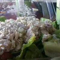 Waldorf Chicken Salad · Choose between our popular Waldorf chicken salad served on a bed of chopped lettuce and toma...