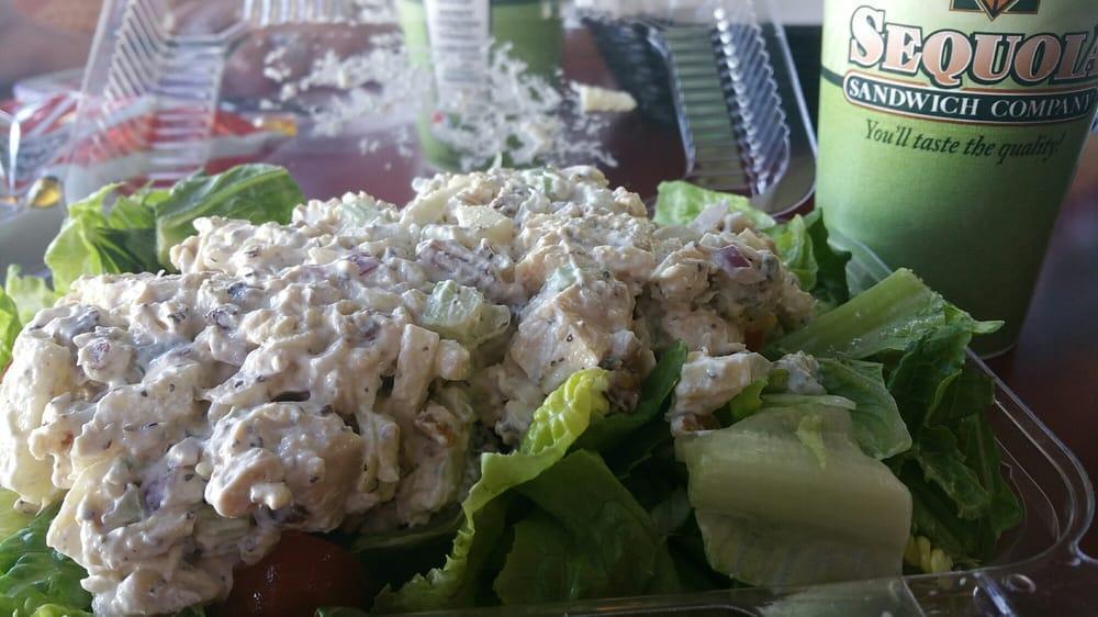 Waldorf Chicken Salad · Choose between our popular Waldorf chicken salad served on a bed of chopped lettuce and tomatoes.