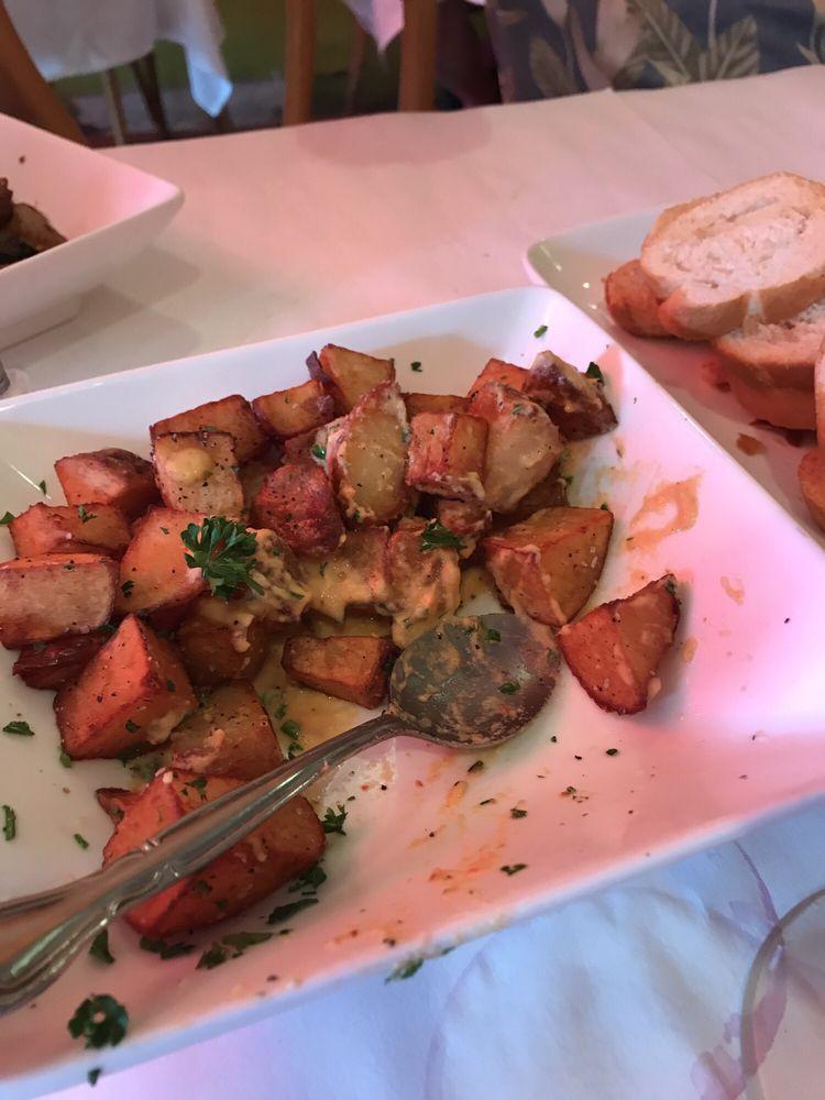 Patatas Bravas · Fried potatoes served with our famous 