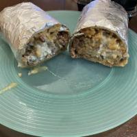 Super Burrito · Meat, rice, beans, cheese, salsa, guacamole and sour cream.