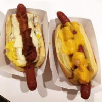 Tater Tot Dog · Tater tots, bacon and cheese sauce.