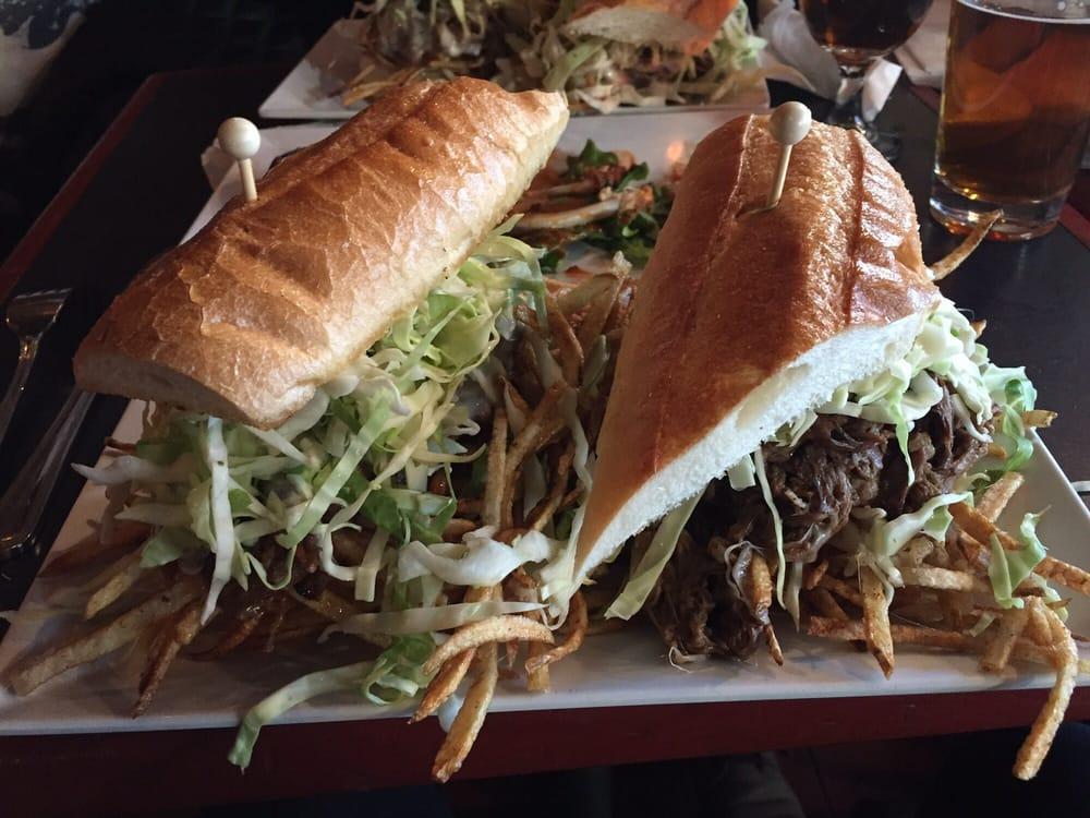 Steel City Sandwich · Beef brisket with melted mozzarella cheese,  fries and citrus slaw.
