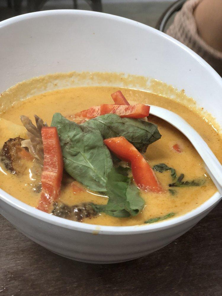 Red Curry · Carrots, peas, bamboo shoots, basil and red bell peppers. Contains coconut milk and served with a side of rice.