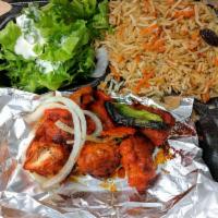 Chicken Kabob · Antibiotic-free, free range. Marinated in Afghan blend of spices, boneless chunks of chicken...
