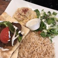 Falafel Platter · Served with homemade hummus, tandoori bread, Shiraz salad with olive oil and balsamic. Tahin...